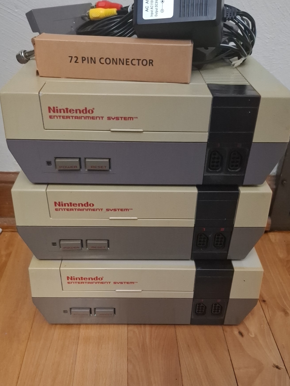 Nintendo NES Classic Consoles Stack - Beige and Gray with Black Accents